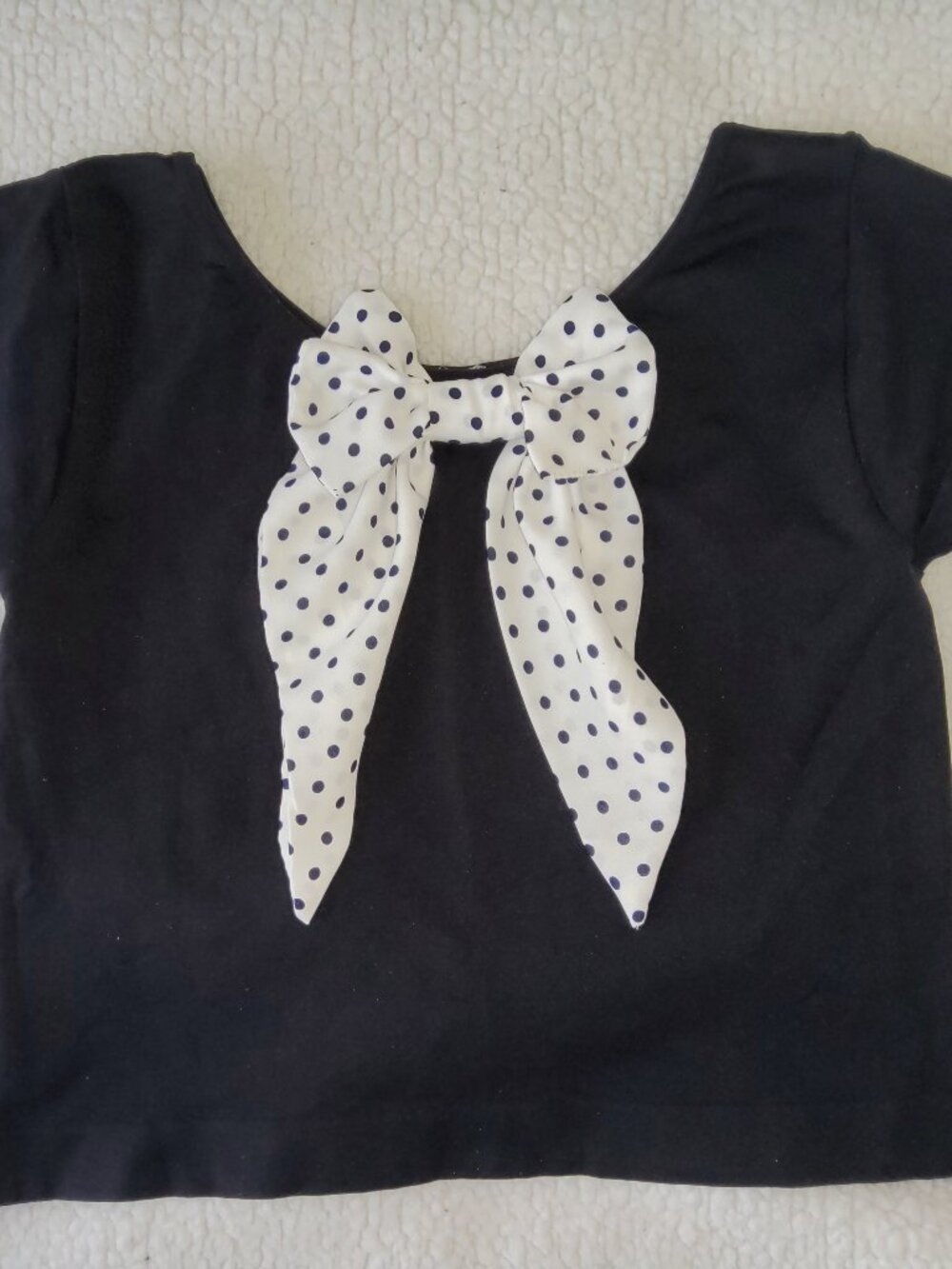 Upcycled Scoop-Neck Black Baby Tee with Hand-Sewn Polka Dot  Bow Appliqué